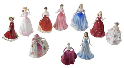 Lot 109 - A collection of ceramic figurines, to include...