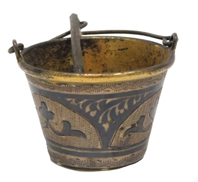 Lot 404 - A Russian niello bucket shaped strainer, with...