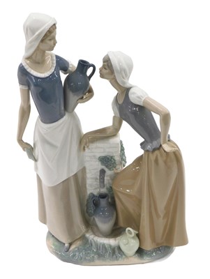Lot 465 - A large Nao figure group, of two ladies...
