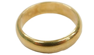 Lot 441 - A plain wide wedding band, stamped 18k and...