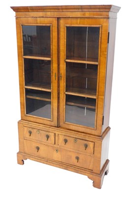 Lot 1068 - A walnut bookcase, in mid 18thC style, the top...