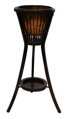 Lot 1078 - An Edwardian mahogany jardiniere stand, with...
