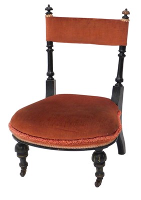 Lot 1157 - A Victorian ebonised and parcel gilt nursing...