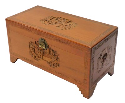Lot 1173 - A 20thC Oriental camphor wood chest, the top...