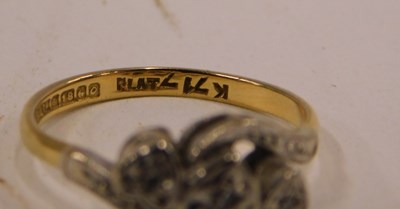 Lot 88 - A gold platinum and diamond three stone ring,...