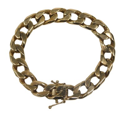 Lot 3 - A 9ct gold flattened curb bracelet, 16cm long,...