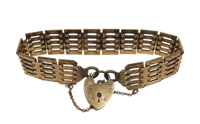 Lot 11 - A 9ct gold gate bracelet, of five bar design,...