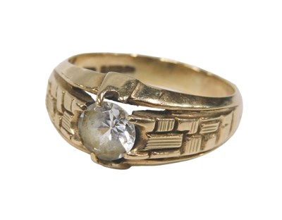 Lot 57 - A 9ct gold rose gold solitaire ring, set with...