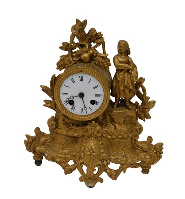 Lot 218 - A late 19thC gilt metal mantel clock, the 7cm...