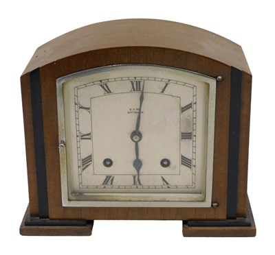 Lot 230 - A 1930s Art Deco walnut and ebonised mantel...