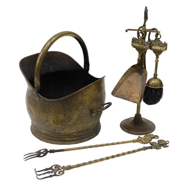Lot 407 - Various brassware, early 20thC coal helmet,...