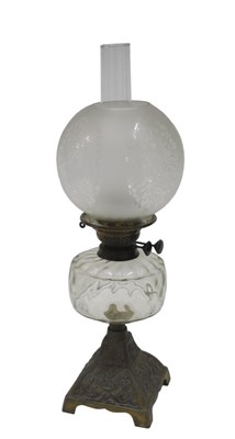 Lot 236 - A late Victorian oil lamp, with clear...