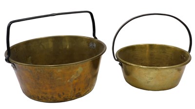 Lot 415 - An early 20thC brass jam pan, of circular form,...