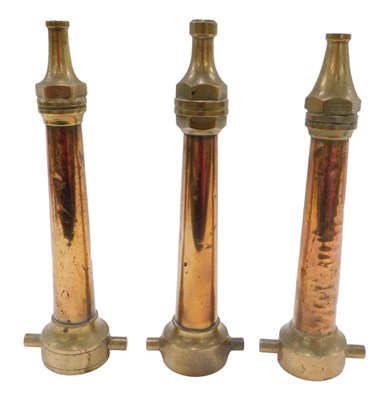 Lot 456 - An early 20thC copper and brass fire hose...