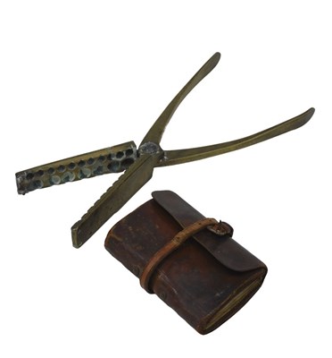 Lot 274 - A 20thC brass carbine bullet mould, with...