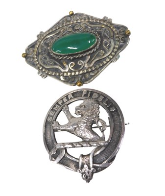 Lot 563 - A silver lion passant buckle crested brooch,...