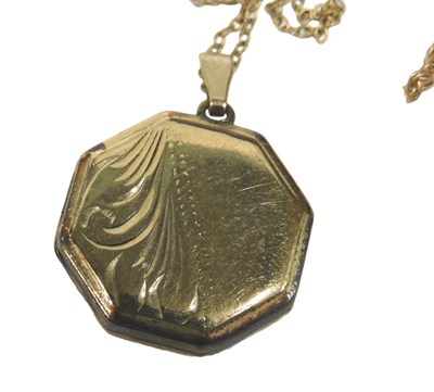 Lot 552 - Two neck chains, comprising a fine link neck...