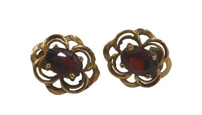 Lot 556 - A pair of 9ct gold garnet cluster...