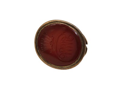 Lot 544 - A 19thC seal fob, the oval orange agate...