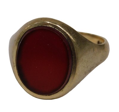 Lot 523 - A 9ct gold signet ring, the ring head set with...