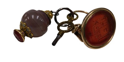 Lot 527 - Two 19thC fobs, comprising a gilt seal fob,...