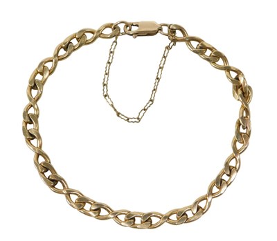Lot 41 - A flattened curb bracelet, with clip clasp and...