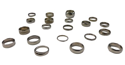 Lot 568 - Twenty dress rings, each white metal stamped...