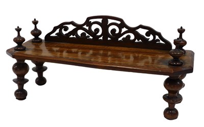 Lot 293 - An early 20thC open shelf or stand, with...
