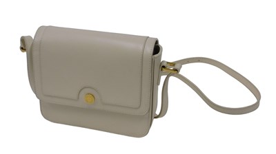 Lot 294 - A ladies cream evening bag, marked Harrods of...