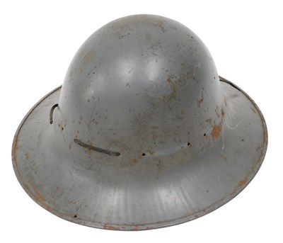 Lot 378 - A British WWII Zuckerman style tin helmet for...