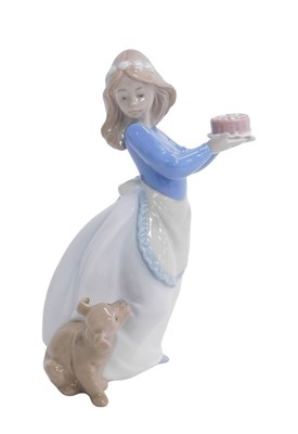Lot 504 - A Nao figure group Puppy's Birthday, 21cm high,...
