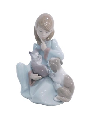 Lot 512 - A Lladro figure group, Cat Nap, 13cm high, boxed.