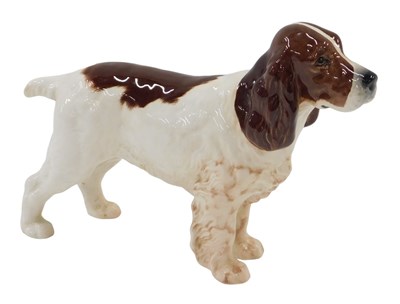 Lot 97 - A Beswick figure of a cocker spaniel standing,...