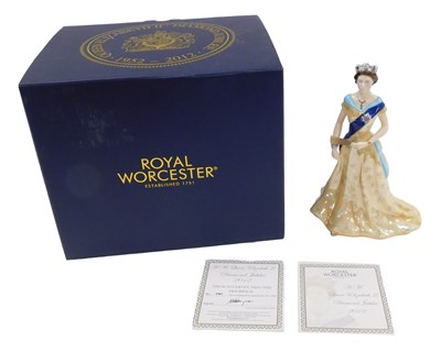 Lot 83 - A Royal Worcester figure group HM Queen...