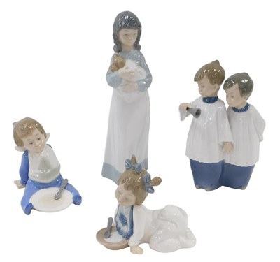 Lot 642 - Four various Nao figures, to include young boy...