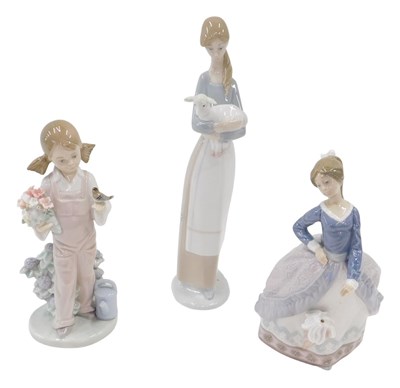 Lot 643 - Three various Lladro figures, to include Evita,...