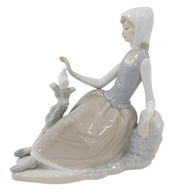 Lot 645 - A Lladro figure group Shepherdess with dove,...