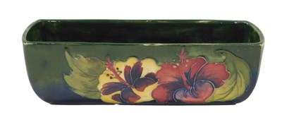 Lot 651 - A Moorcroft pottery Green Hibiscus pattern...