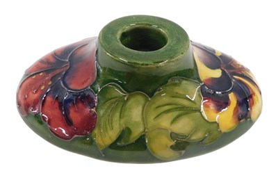 Lot 654 - A Moorcroft pottery Green Hibiscus pattern...