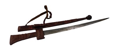 Lot 682 - An African Tebu type sword, part decorated...