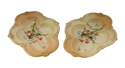 Lot 690 - A pair of Royal Worcester blush ivory...