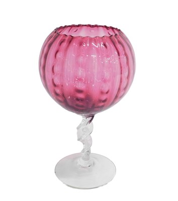 Lot 588 - A 20thC cranberry style and clear glass goblet,...