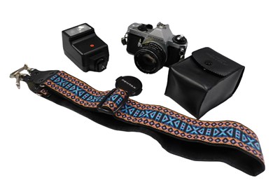 Lot 713 - A Pentax camera, MV1, with 1:2 50mm 4891574...