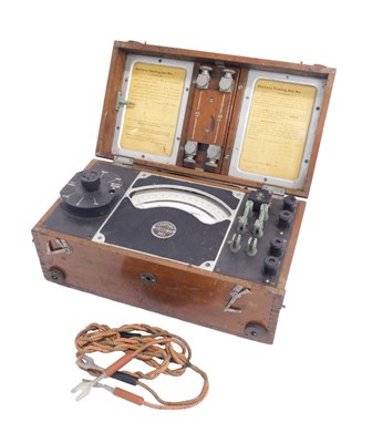 Lot 595 - A 20thC testing set, for a current...