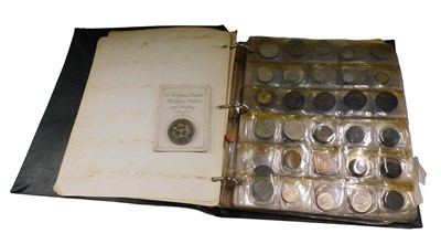 Lot 725 - Various coins, an album containing a quantity...