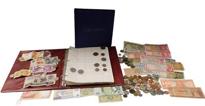 Lot 736 - Various coins, an album containing a quantity...