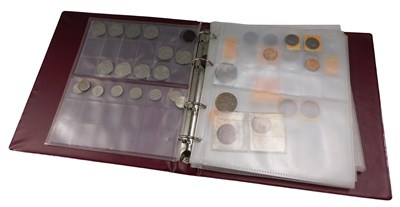 Lot 740 - Various coins, an album containing various...