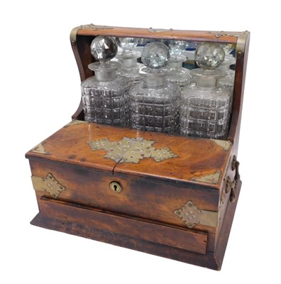Lot 743 - An Edwardian oak Compendium tantalus, with...