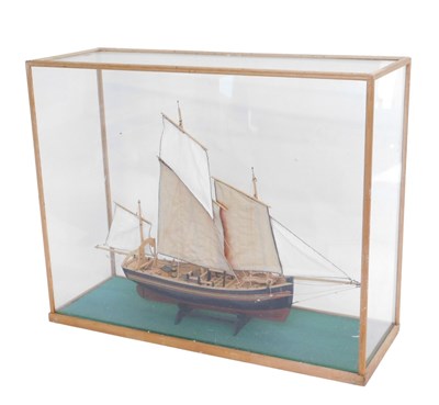 Lot 634 - A cased model of a ship, with realistic deck...