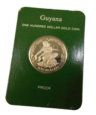 Lot 147 - A Guyana one hundred dollar gold proof coin,...